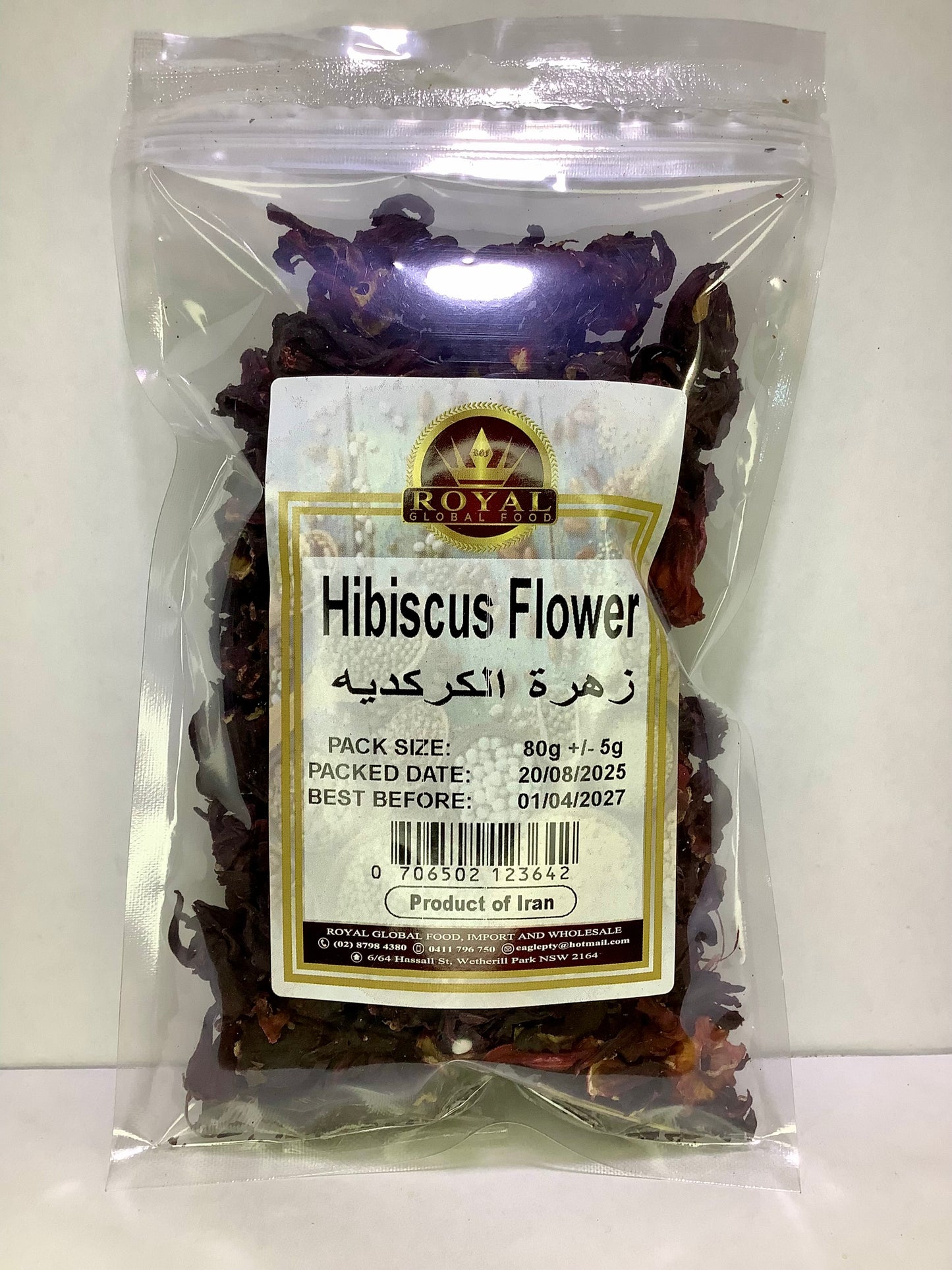 Packaged hibiscus flowers with a visible label on a white background