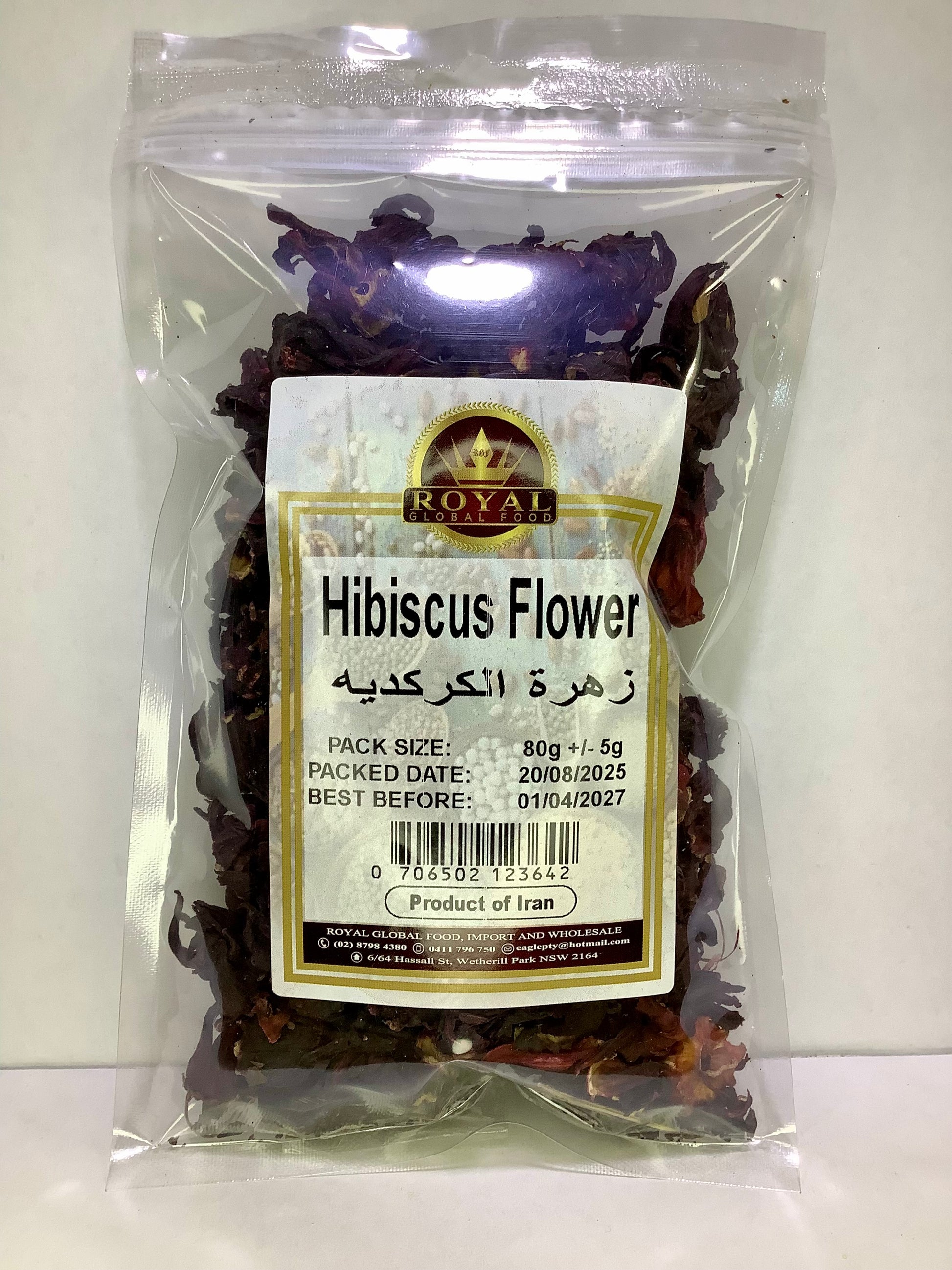 Packaged hibiscus flowers with a visible label on a white background