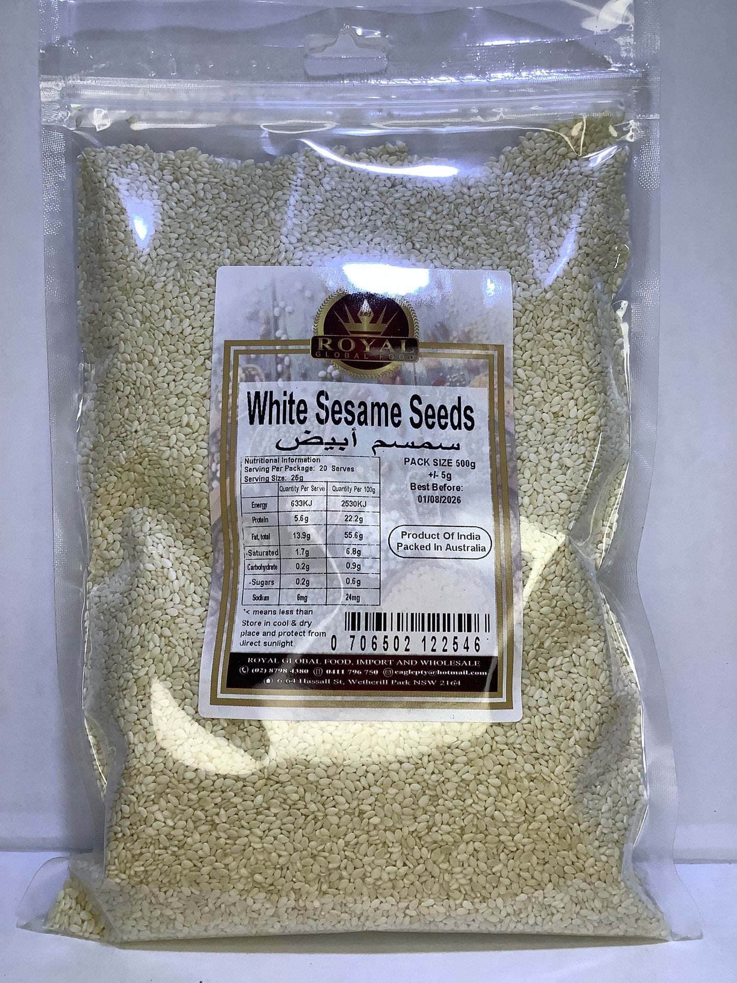 Packaged white sesame seeds with a label on a white background